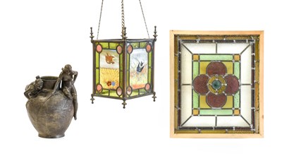 Lot 605 - An Aesthetic Movement Brass Framed and Leaded...