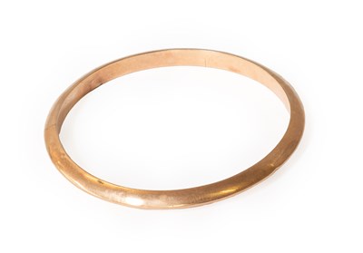 Lot 459 - A 9 Carat Gold Bangle, inner diameter 7.4cm (a....