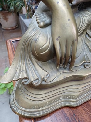 Lot 82 - A Malaysian Bronze Figure of a Seated Buddha,...