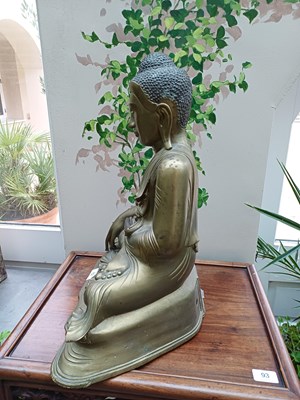 Lot 82 - A Malaysian Bronze Figure of a Seated Buddha,...