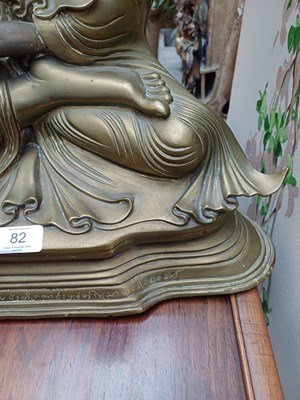 Lot 82 - A Malaysian Bronze Figure of a Seated Buddha,...