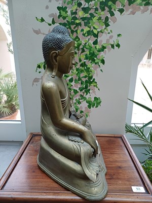 Lot 82 - A Malaysian Bronze Figure of a Seated Buddha,...