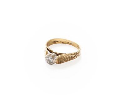 Lot 222 - An 18 Carat Gold Diamond Solitaire Ring, the...