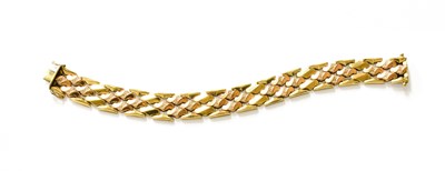 Lot 245 - A 9 Carat Bi-Colour Gold Fancy Link Bracelet,...