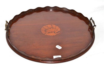 Lot 253 - Edwardian mahogany circular tray with scalloped gallery