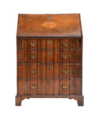 Lot 434 - A Solid Rosewood or Padouk Wood Block-Front...