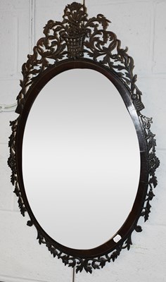 Lot 1299 - An Early 19th Century Oval Wall Mirror, with...