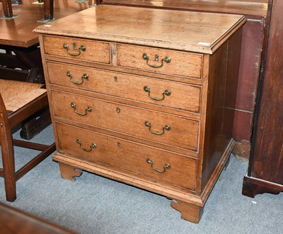 Lot 1275 - A George III Light Oak Four Height Chest of...