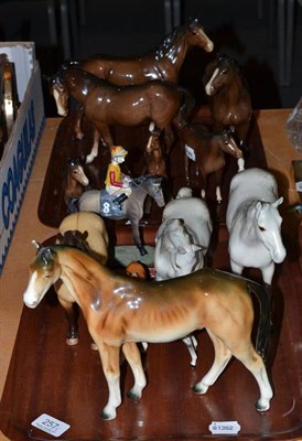 Lot 257 - A collection of predominantly bay Beswick horses and foals, one Royal Dux Bohemia horse figure...