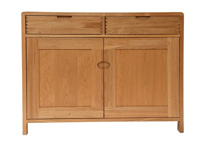 Lot 1146 - An ERCOL Bosco Pale Oak Sideboard, curved...