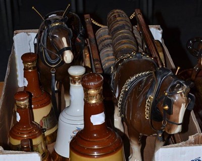 Lot 258 - A Mouseman ashtray, six Bells Whisky decanters (full), two decorative shire horse figures (one with