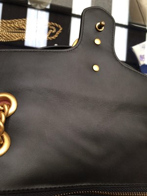 Lot 1025 - A Gucci GG Black Marmont Flap Leather Bag,...