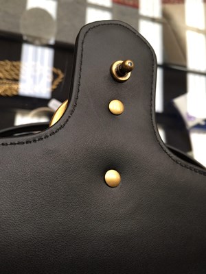 Lot 1025 - A Gucci GG Black Marmont Flap Leather Bag,...