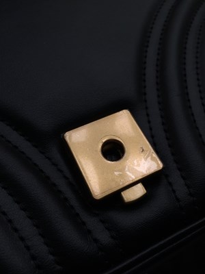 Lot 1025 - A Gucci GG Black Marmont Flap Leather Bag,...