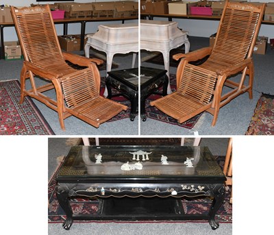 Lot 1327 - A Pair of Hardwood Steamer Chairs in Chinese...