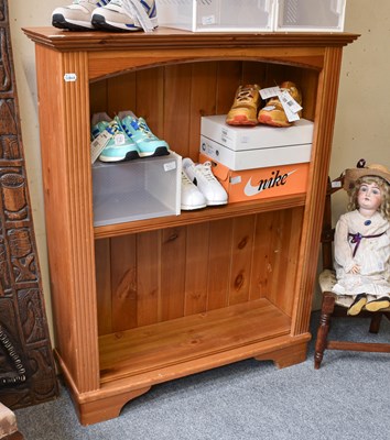 Lot 1346 - A Modern Pine Open Bookcase, with two...