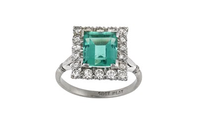 Lot 2312 - An Emerald and Diamond Cluster Ring the step...