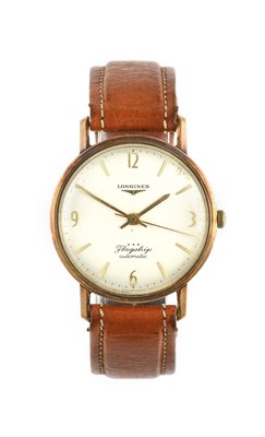 Lot 2473 - Longines: A 9 Carat Gold Automatic Centre...