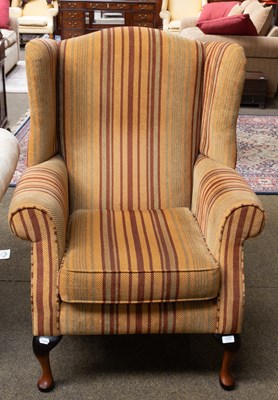 Lot 1347 - A Parker Knoll Wing Chair, second half of the...
