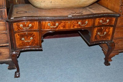 Lot 306 - Mahogany serpentine desk