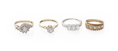 Lot 223 - A 14 Carat Gold Cubic Zirconia Solitaire Ring,...