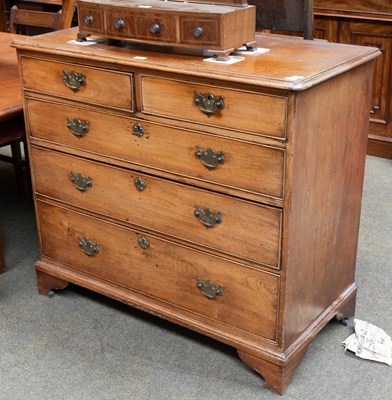Lot 1377 - A George III Mahogany Chest of Drawers, four...