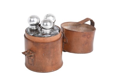 Lot A Cased Set of Three Victorian Silver-Mounted Glass Flasks