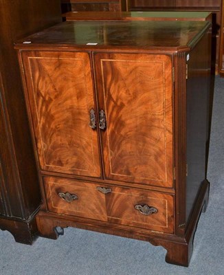 Lot 328 - A mahogany TV cabinet