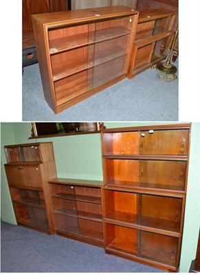 Lot 330 - Six teak bookcases, two labelled Minty, Oxford