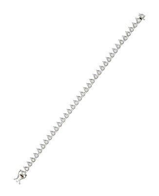 Lot 2329 - An 18 Carat White Gold Diamond Line Bracelet...