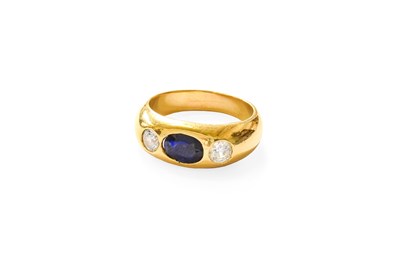 Lot 194 - A Synthetic Sapphire and Cubic Zirconia Three...