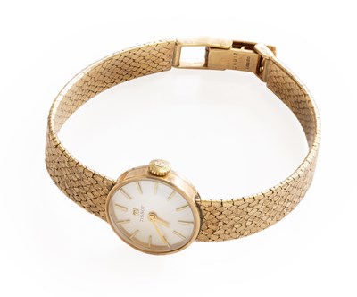 Lot 381 - A Lady's 9 Carat Gold Tissot Wristwatch,...