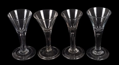 Lot 5 - A Near Set of Four Wine Glasses, circa 1770,...