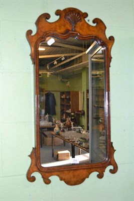 Lot 354 - Georgian style walnut veneered fretwork mirror