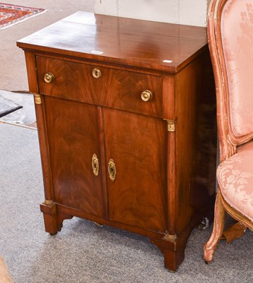 Lot 1401 - A Mahogany French Empire Two Door Cabinet,...