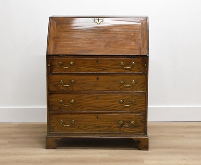Lot 481 - A George III Elm Bureau, late 18th century,...