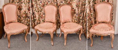 Lot 1402 - A Set of Four French Distressed Gilt Side...