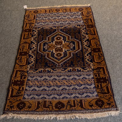 Lot 1258 - Baluch Mixed Technique Rug, the field with a...