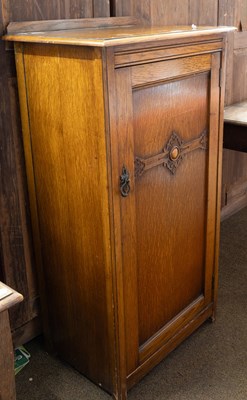 Lot 1327 - An Early 20th Century Oak Cupboard, the carved...