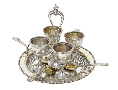 Lot A Victorian Parcel-Gilt Silver Egg-Cruet With a Set of Four Associated Egg-Spoons