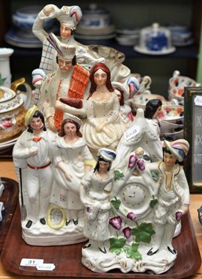 Lot 31 - Seven assorted Staffordshire pottery figures