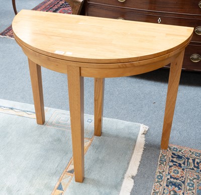 Lot 1209 - A Modern Oak Demi Lune Foldover Card Table
