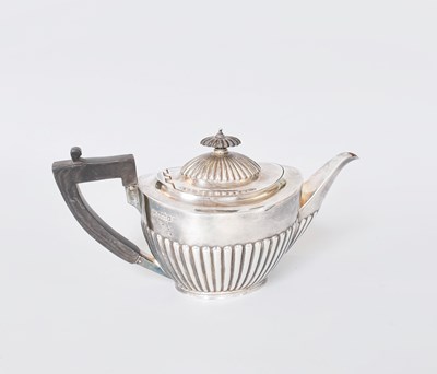 Lot 114 - A Victorian Silver Teapot, by William Gibson...