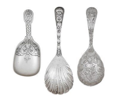 Lot Three George III and Later Silver Caddy-Spoons,...