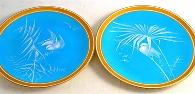 Lot 48 - A pair of Minton pate-sur-pate plates