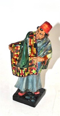 Lot 50 - A Doulton figure, Carpet Seller