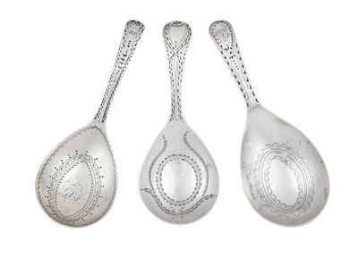 Lot Three George III Silver Caddy-Spons, by Thomas...