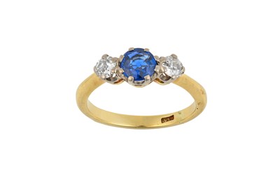Lot 2354 - A Sapphire and Diamond Three Stone Ring the...