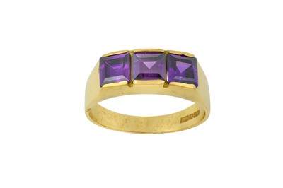 Lot 2331 - An 18 Carat Gold Amethyst Ring three square...