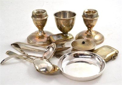 Lot 70 - A pair of silver loaded candlesticks, small stamp box, small silver dish, silver vesta, an egg...